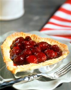 Heart-shaped cherry tartlet