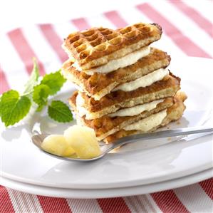 Heart-shaped coconut waffles with pineapple cream