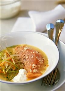 Salmon in Riesling stock with strips of vegetables