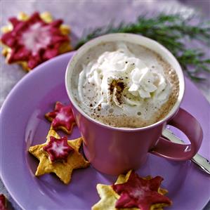 Hot chocolate with star-shaped biscuits