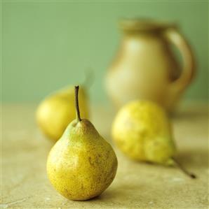 Three pears, a jug behind