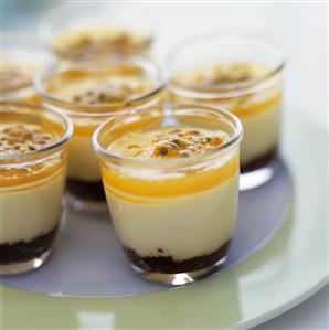 Cheesecakes with passion fruit in glasses