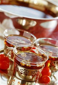 Tomato consommé served in glasses