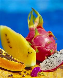 Slice of papaya, piece of yellow watermelon & red pitahaya