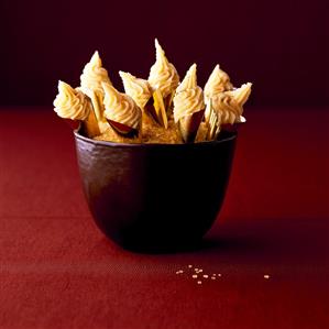 White chocolate cones in chocolate bowl