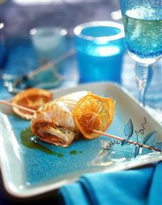 Turbot rolls on skewer with curried orange marinade