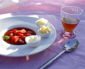 Strawberry soup with three kinds of fruit granitas; iced tea