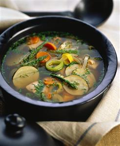 Bouillon with vegetables and salmon