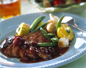 Goose breast & cherry sauce; patty pan squash, onions & beans