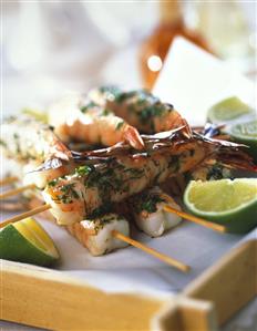 Shrimp kebabs with herbs for grilling