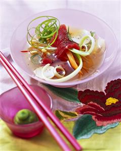 Tuna soup in glass bowl