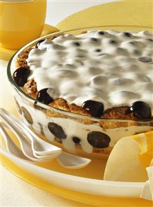 Layered dessert with grapes and quark cream