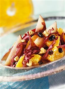 Raw red cabbage salad with plums and oranges