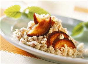 Millet pudding with ginger and plums