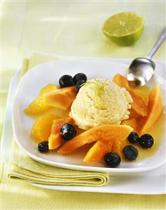 Lime ice cream with fruit salad