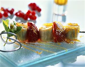 Caramelised skewered fruit