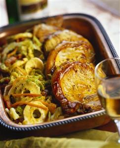 Glazed pork chops with apples and cabbage