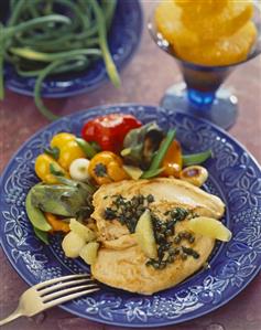 Chicken breast with lemon and capers, garden vegetables