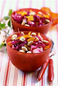 Red cabbage salad with peanuts and apples