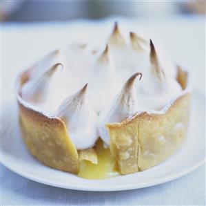 Apple cake with meringue topping, broken open