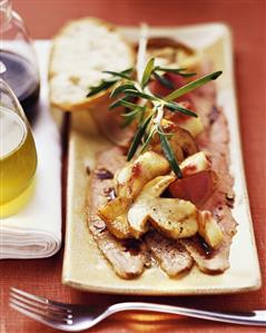 Boiled fillet of veal with ceps and peaches