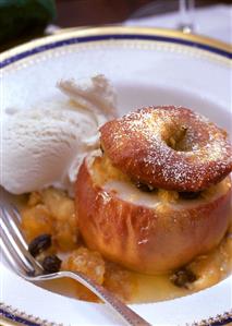 Baked Apple Stuffed with Apricots and Raisins; Vanilla Ice Cream; Powdered Sugar