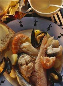 Soup with fish, potatoes and seafood (Cotriade)