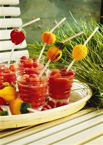 Pink drinks with raspberries, melon balls, coloured straws (2)