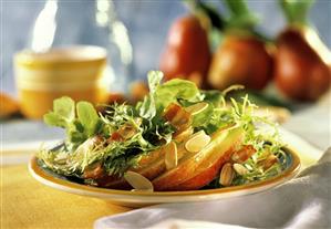 Single Serving of Salad with Greens Pear Slices and Almonds