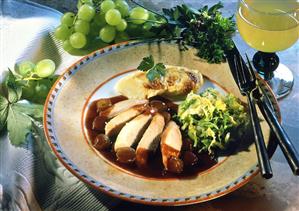 Chicken breast with grape sauce and savoy
