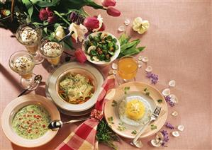 Menu: herb soup, corn salad, ravioli, apple puree, souffle