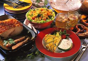 Buffet with pork, pasta salad, courgette quiche & punch