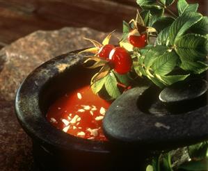 Rosehip soup with chopped almonds