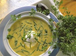 Chard cream soup with poached egg and chervil