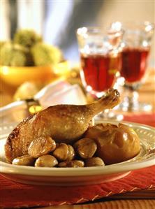 Christmas goose with baked apples and glazed chestnuts