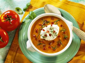 Tomato & potato soup with bacon, cream & basil strips