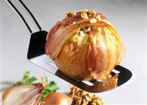 Apples stuffed with sauerkraut, with bacon slices & nuts