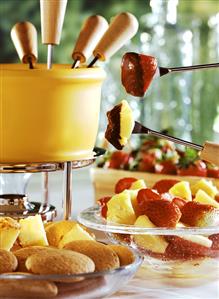 Chocolate mint fondue with strawberries, pineapple & biscuits