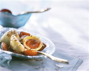 Damson dumplings with chopped hazelnuts on plate (1)