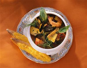 Fish soup with mussels & shrimps in soup pot (1)