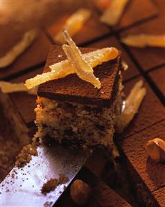 Chocolate & ginger squares with candied ginger on knife (1)