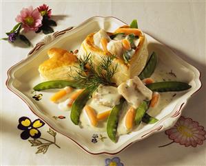 Heart-shaped pie with coley, carrots, mangetouts