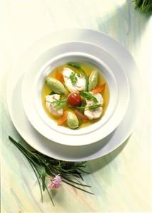 Clear stew of North Sea fish with semolina dumplings