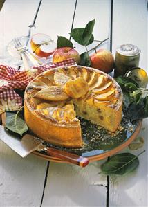 Apple and rice cake, a piece cut, decoration: apples