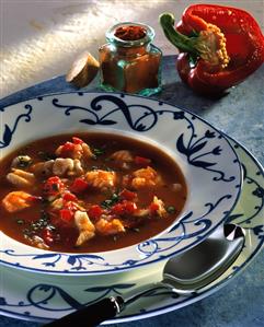 Hungarian fish soup with red pepper and paprika