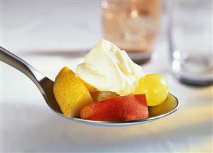 Fresh fruit with orange dip on spoon (2)