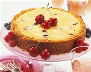 Cheesecake with cherries and raspberries