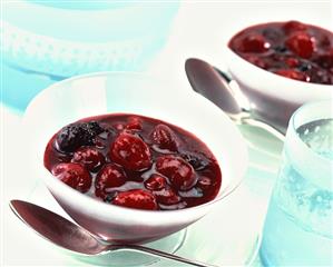 Red stewed fruit in bowls