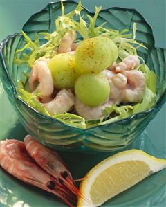 Prawn cocktail with melon balls on curly endive