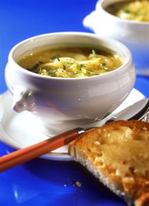 Onion soup in a soup bowl with cheese toasties